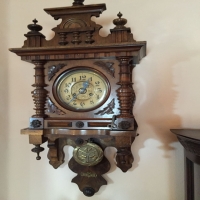 antique-wall-clock-14256559213.jpg
