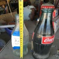 tall-coca-cola-bottle-sculptures-14238683641.jpg