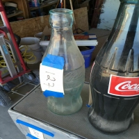 tall-coca-cola-bottle-sculptures-14238683643.jpg