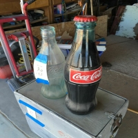 tall-coca-cola-bottle-sculptures-14238683644.jpg