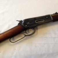 winchester-rifle-1886-14200561665.jpg