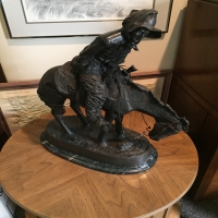 bronze-horseback-rider-statue-1426303049.jpg