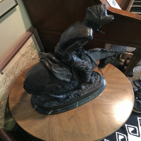 bronze-horseback-rider-statue-14263030494.jpg
