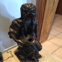 bronze-woman-statue-14263045221.jpg