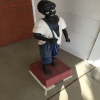 sculpture-of-boy-in-overalls-1426303969.jpg